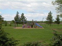 Roseglen Park playground equipment in the summer